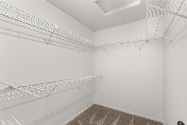 3628 Somerset Ave, Redding, CA 96002 - spacious closet featuring carpet flooring and attic access