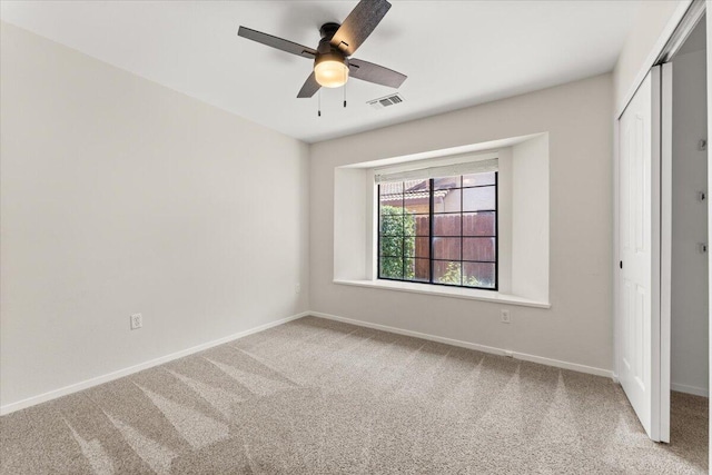 3628 Somerset Ave, Redding, CA 96002 - unfurnished bedroom with a closet, carpet flooring, and a ceiling fan