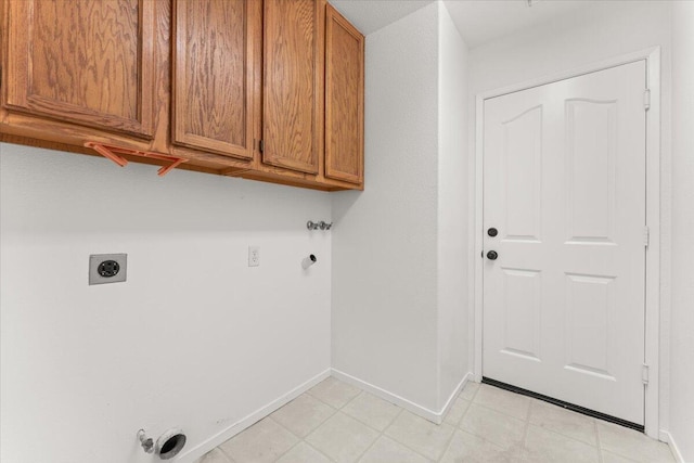 3628 Somerset Ave, Redding, CA 96002 - laundry room with electric dryer hookup, hookup for a gas dryer, cabinet space, and washer hookup