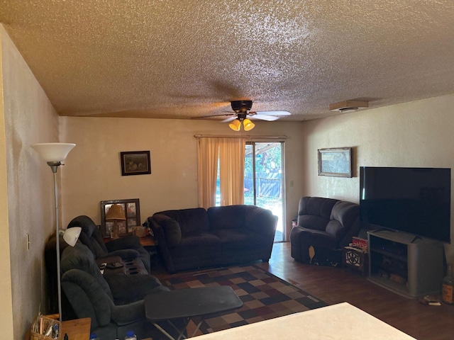 20194 Sugar Pine St, Burney, CA 96013 - living room featuring a textured ceiling, wood finished floors, and a ceiling fan