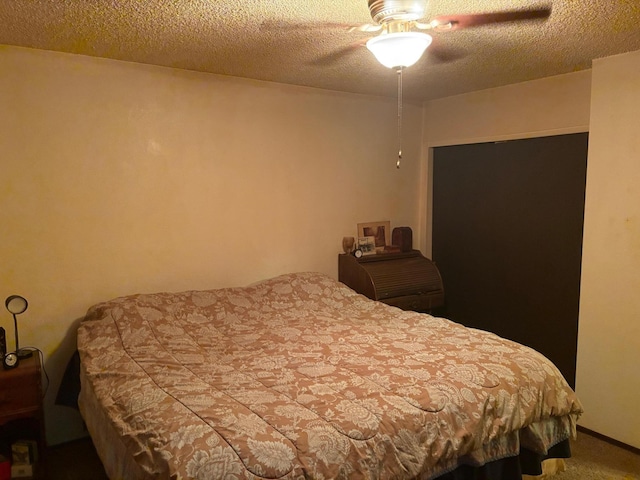 20194 Sugar Pine St, Burney, CA 96013 - bedroom featuring carpet, a textured ceiling, and a ceiling fan