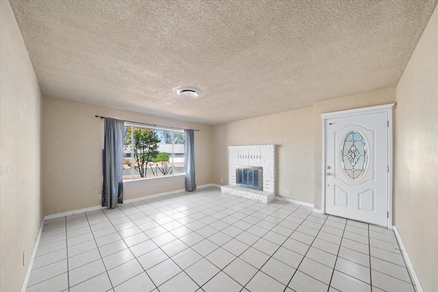 3255 Winding Way, Redding, CA 96003 - unfurnished living room featuring light tile patterned floors, a brick fireplace, and a textured ceiling