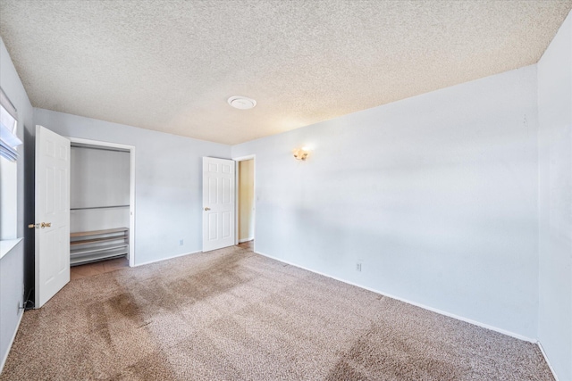 3255 Winding Way, Redding, CA 96003 - unfurnished bedroom with carpet and a textured ceiling