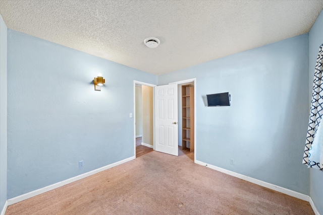 3255 Winding Way, Redding, CA 96003 - empty room featuring carpet and a textured ceiling
