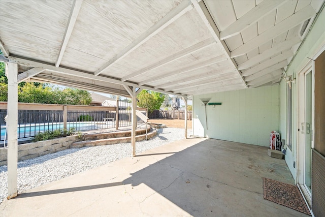 3255 Winding Way, Redding, CA 96003 - fenced backyard with a patio and a carport