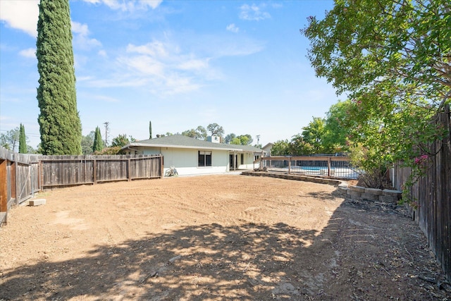 3255 Winding Way, Redding, CA 96003 - rear view of property with a fenced backyard