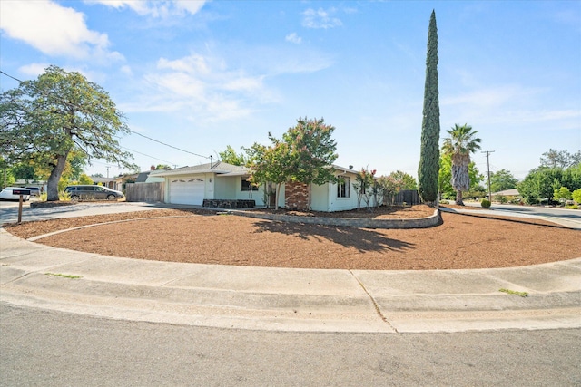 3255 Winding Way, Redding, CA 96003 - view of front facade with driveway and an attached garage
