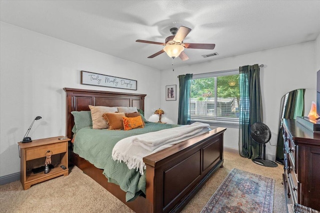 2236 Lonigan Ct, Redding, CA 96001 - bedroom with light colored carpet and ceiling fan