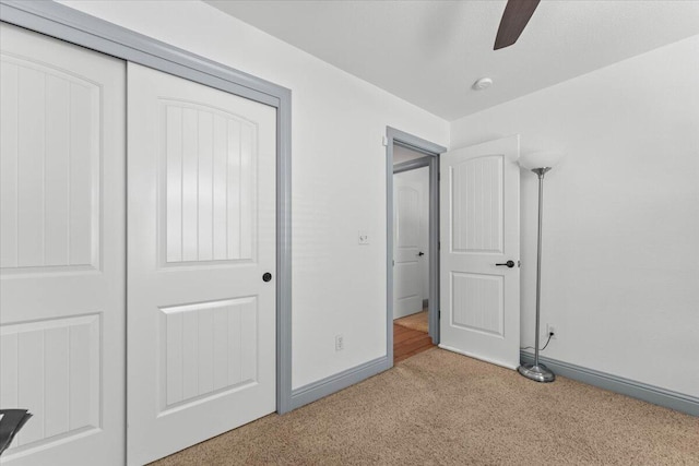 2236 Lonigan Ct, Redding, CA 96001 - unfurnished bedroom with carpet, a closet, and ceiling fan