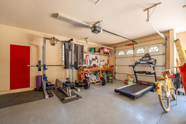 2236 Lonigan Ct, Redding, CA 96001 - exercise area with a garage and a textured ceiling