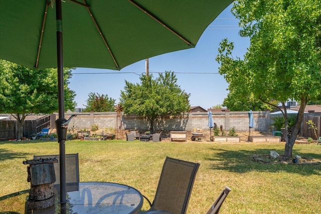 2236 Lonigan Ct, Redding, CA 96001 - fenced backyard with a garden