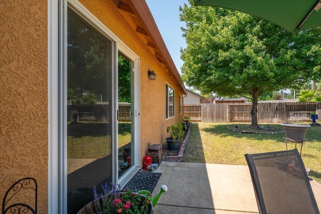 2236 Lonigan Ct, Redding, CA 96001 - fenced backyard featuring a patio area
