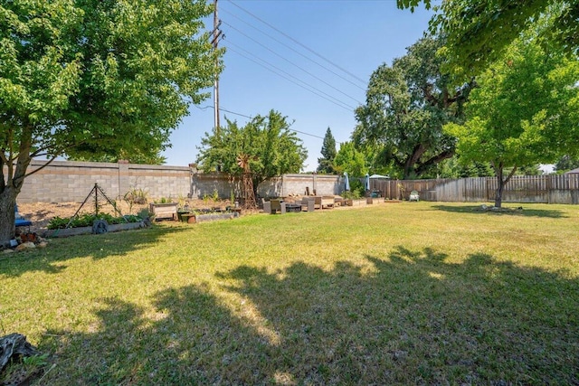 2236 Lonigan Ct, Redding, CA 96001 - fenced backyard with a vegetable garden