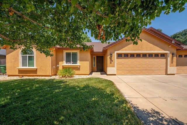 2236 Lonigan Ct, Redding, CA 96001 - single story home featuring stucco siding, a garage, a front yard, and concrete driveway