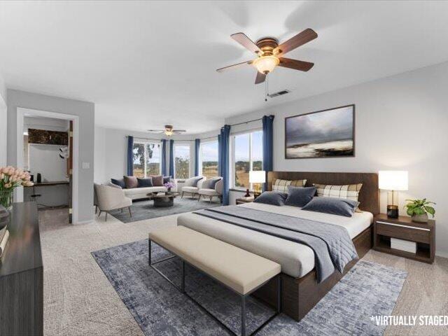 15540 China Rapids Dr, Red Bluff, CA 96080 - carpeted bedroom with multiple windows and a ceiling fan