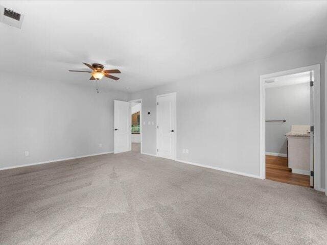 15540 China Rapids Dr, Red Bluff, CA 96080 - carpeted empty room featuring ceiling fan and baseboards
