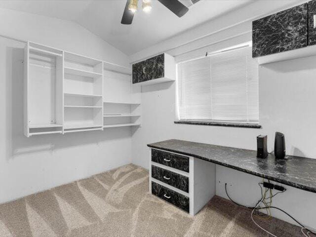 15540 China Rapids Dr, Red Bluff, CA 96080 - spacious closet with carpet flooring, vaulted ceiling, and a ceiling fan