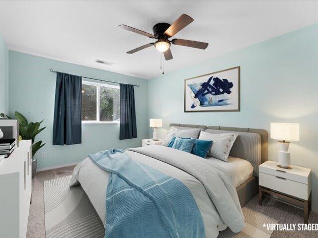 15540 China Rapids Dr, Red Bluff, CA 96080 - carpeted bedroom with ceiling fan and baseboards