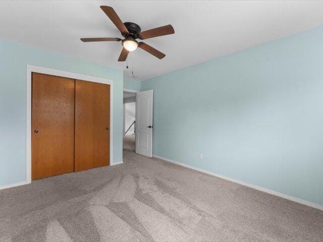 15540 China Rapids Dr, Red Bluff, CA 96080 - unfurnished bedroom with carpet floors, a closet, and ceiling fan