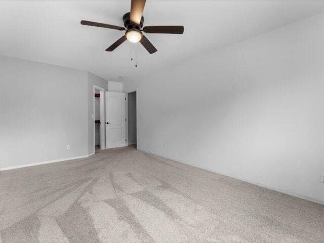 15540 China Rapids Dr, Red Bluff, CA 96080 - spare room featuring light carpet and ceiling fan