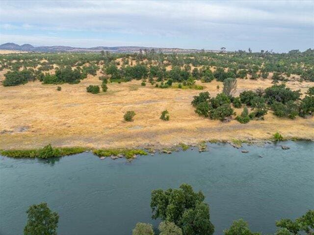 15540 China Rapids Dr, Red Bluff, CA 96080 - drone / aerial view of a water and mountain view