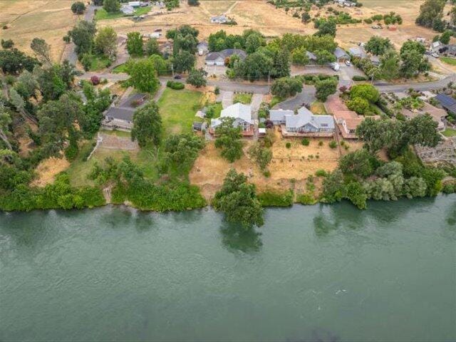 15540 China Rapids Dr, Red Bluff, CA 96080 - aerial overview of property's location featuring a nearby body of water
