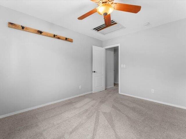 15540 China Rapids Dr, Red Bluff, CA 96080 - empty room with ceiling fan and light carpet