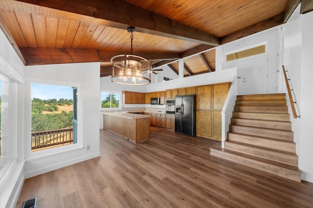 3400 Hillcrest St, Redding, CA 96001 - kitchen featuring black appliances, brown cabinetry, a chandelier, wood ceiling, and light countertops