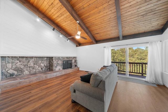3400 Hillcrest St, Redding, CA 96001 - living room featuring track lighting, wooden ceiling, wood finished floors, a fireplace, and a ceiling fan
