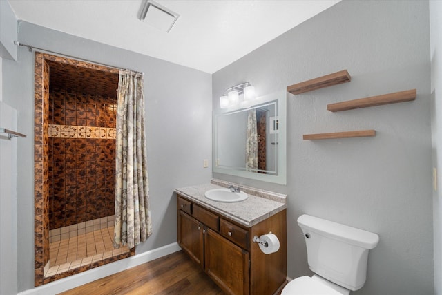 3400 Hillcrest St, Redding, CA 96001 - bathroom featuring vanity, a stall shower, and wood finished floors