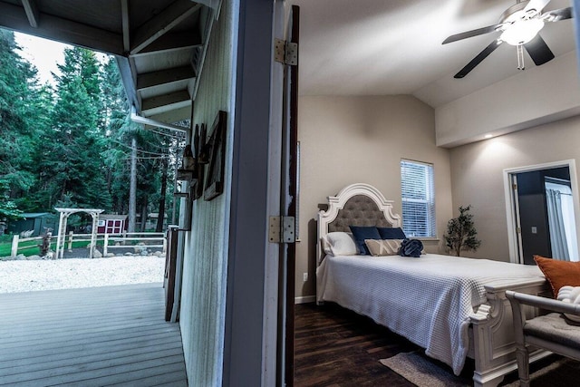 35363 Nehemiah Dr, Shingletown, CA 96088 - bedroom with dark wood-type flooring, vaulted ceiling, a ceiling fan, and access to outside