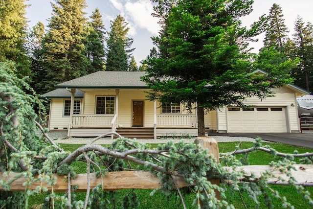 35363 Nehemiah Dr, Shingletown, CA 96088 - view of front facade featuring a porch, asphalt driveway, and a garage
