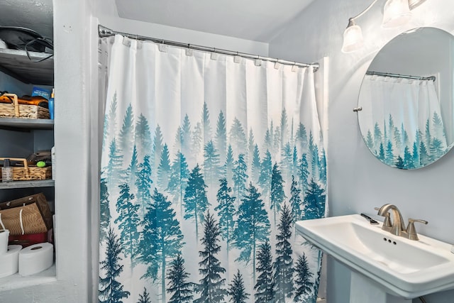 3442 Thomas Ave, Anderson, CA 96007 - bathroom featuring a sink and a shower with curtain