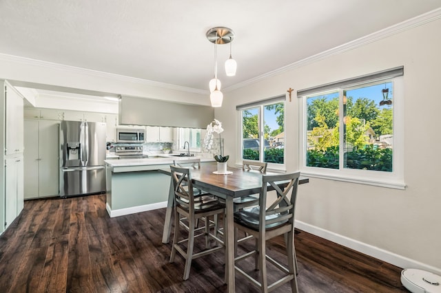 3442 Thomas Ave, Anderson, CA 96007 - dining room featuring dark wood-style floors and crown molding