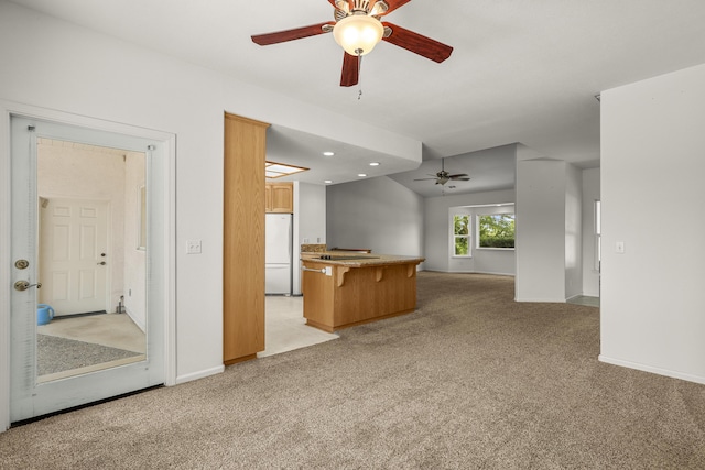 19258 Granola Way, Cottonwood, CA 96022 - unfurnished living room with ceiling fan, light carpet, and recessed lighting