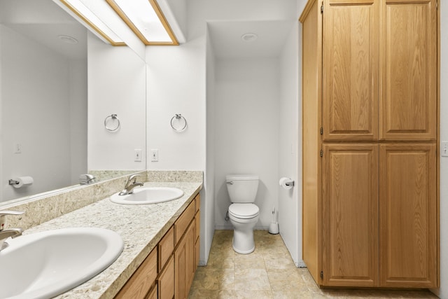 19258 Granola Way, Cottonwood, CA 96022 - bathroom with double vanity and a closet
