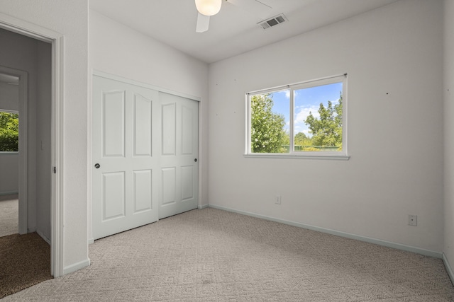 19258 Granola Way, Cottonwood, CA 96022 - unfurnished bedroom with carpet, a closet, and ceiling fan