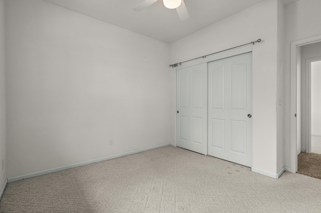 19258 Granola Way, Cottonwood, CA 96022 - unfurnished bedroom featuring light carpet, a closet, and a ceiling fan