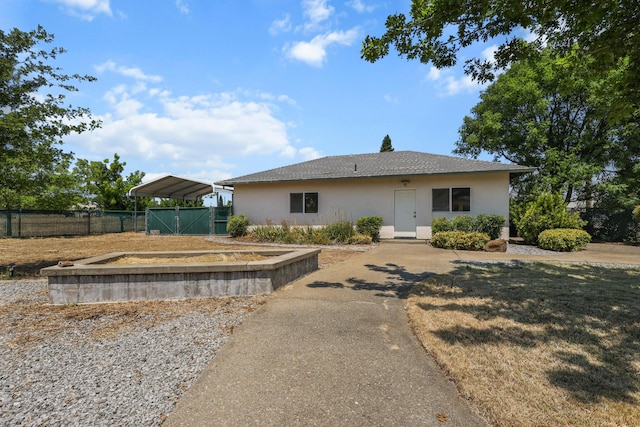 19258 Granola Way, Cottonwood, CA 96022 - view of front of property with a carport and stucco siding