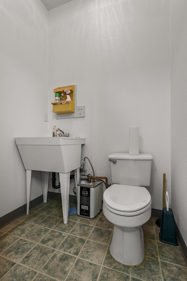 19258 Granola Way, Cottonwood, CA 96022 - half bathroom with toilet and baseboards