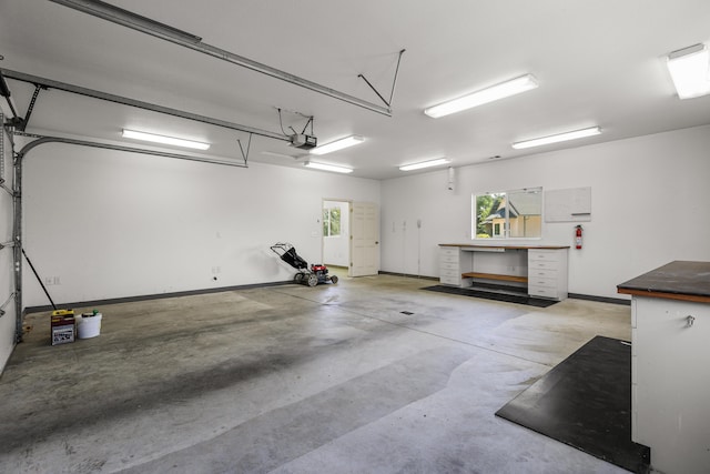 19258 Granola Way, Cottonwood, CA 96022 - garage with a garage door opener and baseboards