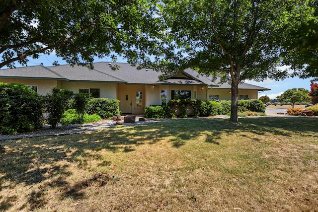 19258 Granola Way, Cottonwood, CA 96022 - ranch-style home with a front yard and stucco siding