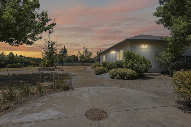 19258 Granola Way, Cottonwood, CA 96022 - yard at dusk with a patio