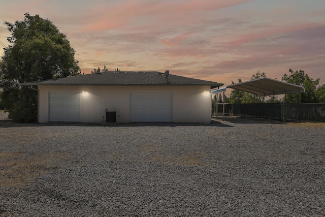 19258 Granola Way, Cottonwood, CA 96022 - garage at dusk with a detached garage
