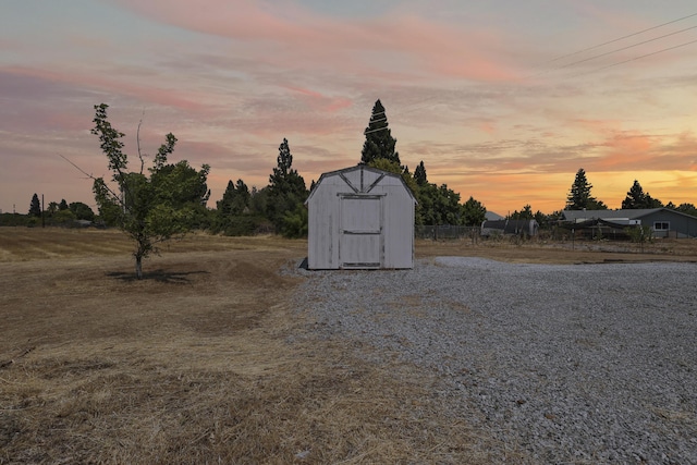 19258 Granola Way, Cottonwood, CA 96022 - yard at dusk with a storage shed