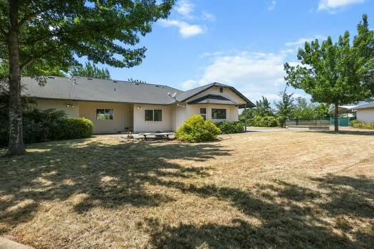 19258 Granola Way, Cottonwood, CA 96022 - back of house with a yard