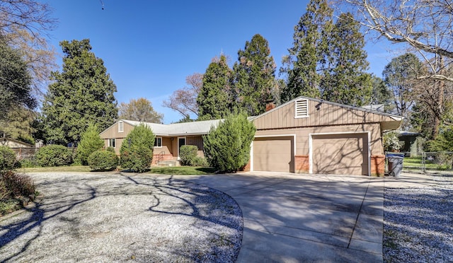 3283 Middleton Ln, Redding, CA 96002 - ranch-style house with concrete driveway, a garage, a chimney, and brick siding