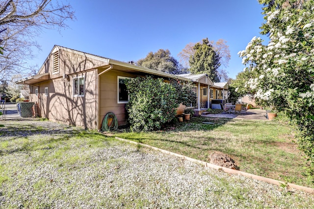 3283 Middleton Ln, Redding, CA 96002 - view of side of property featuring a patio and a central air condition unit