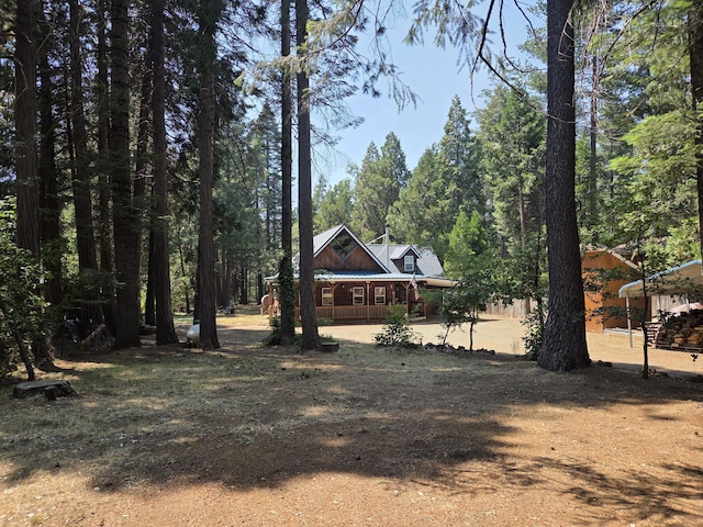 8421 Starlite Pines Rd, Shingletown, CA 96088 - view of yard with a porch