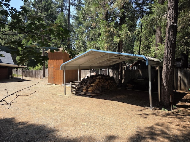 8421 Starlite Pines Rd, Shingletown, CA 96088 - view of parking featuring a carport
